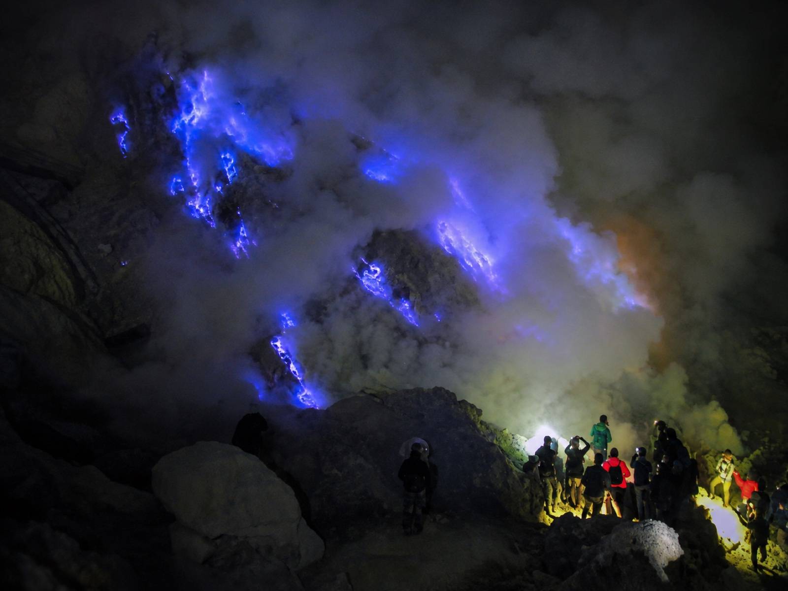 Blue Fire glowing naturally inside Ijen Crater at night