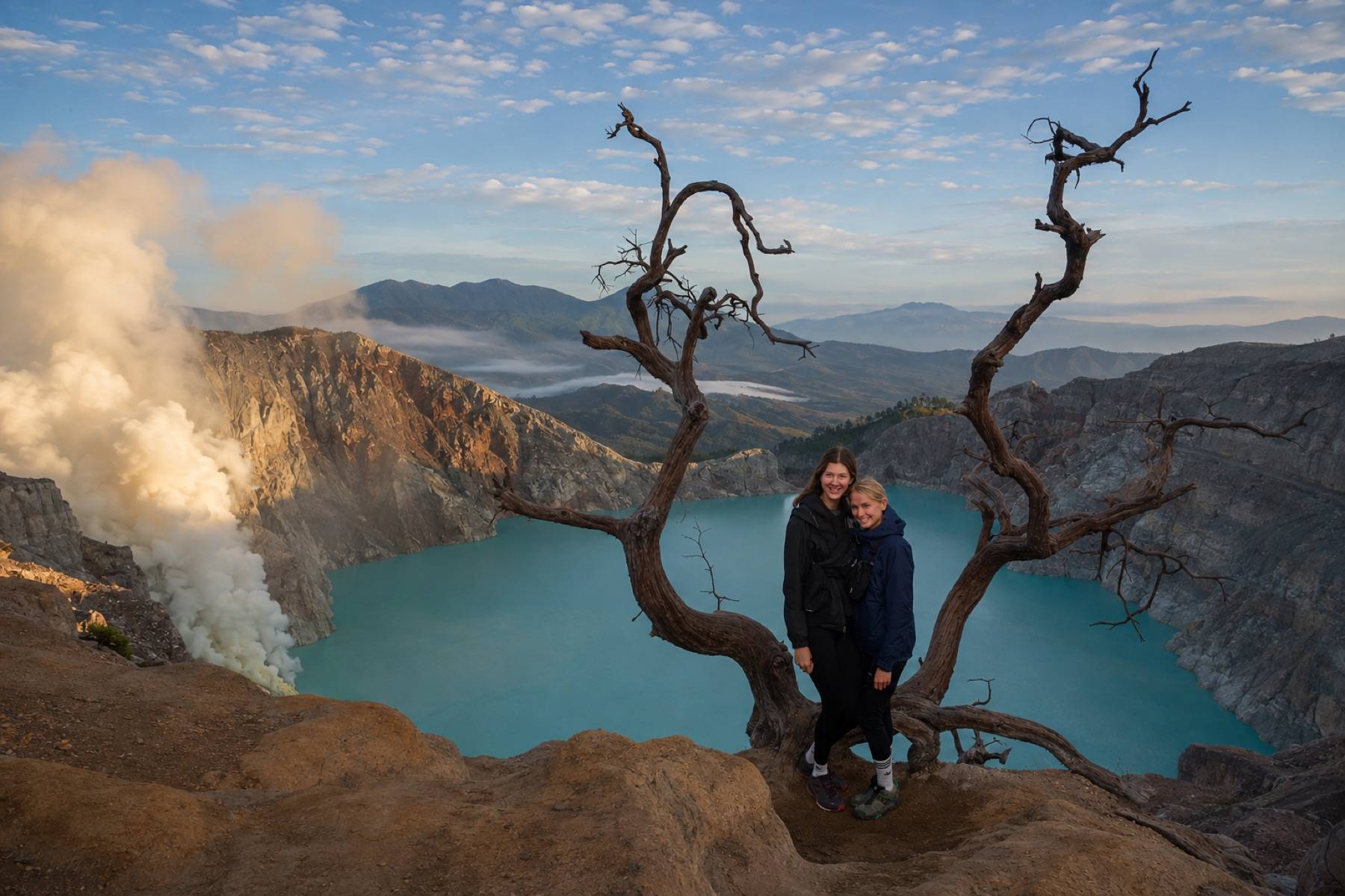 Travellers overlooking Ijen crater