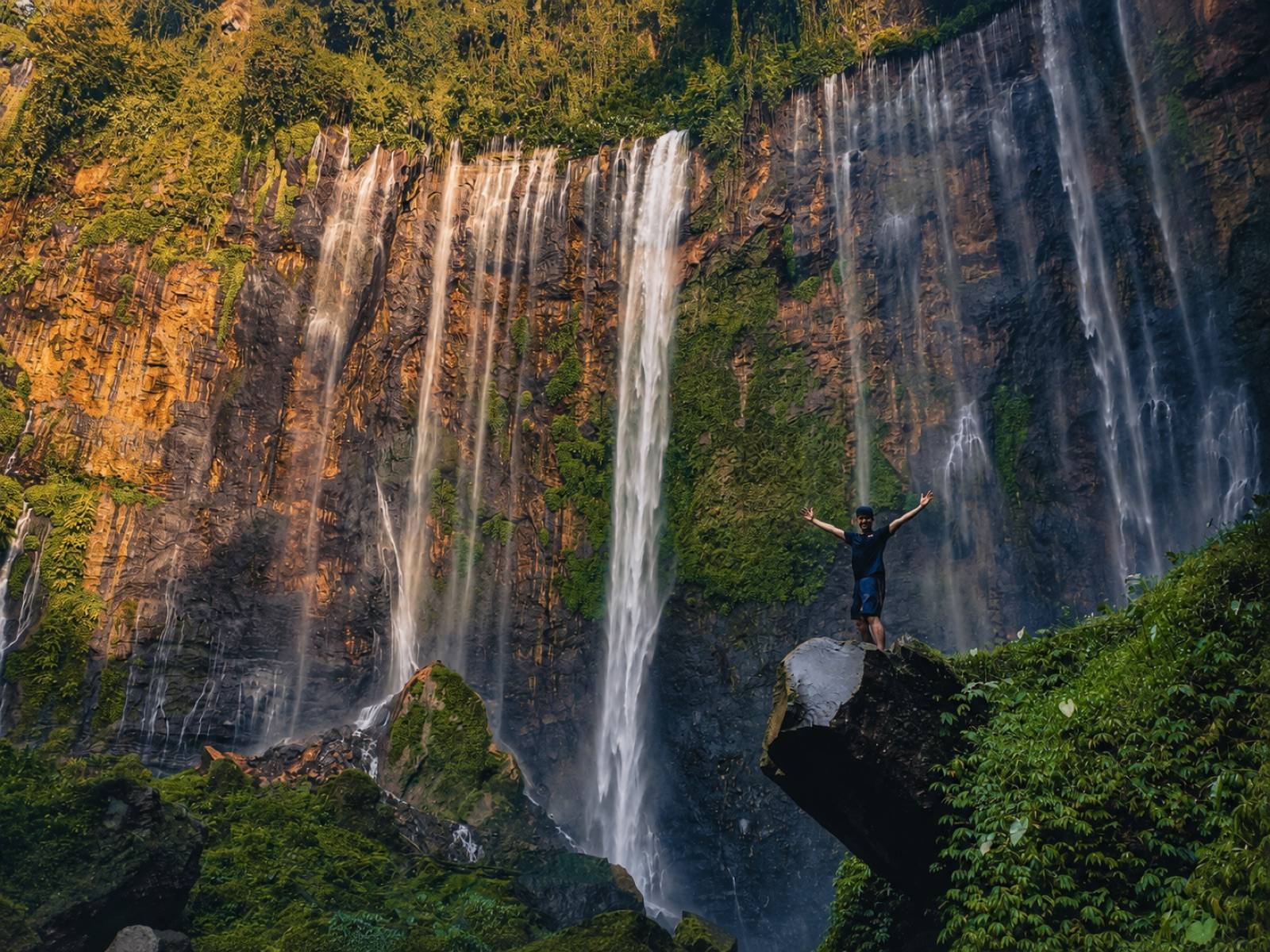 Tumpak Sewu waterfall and traveller